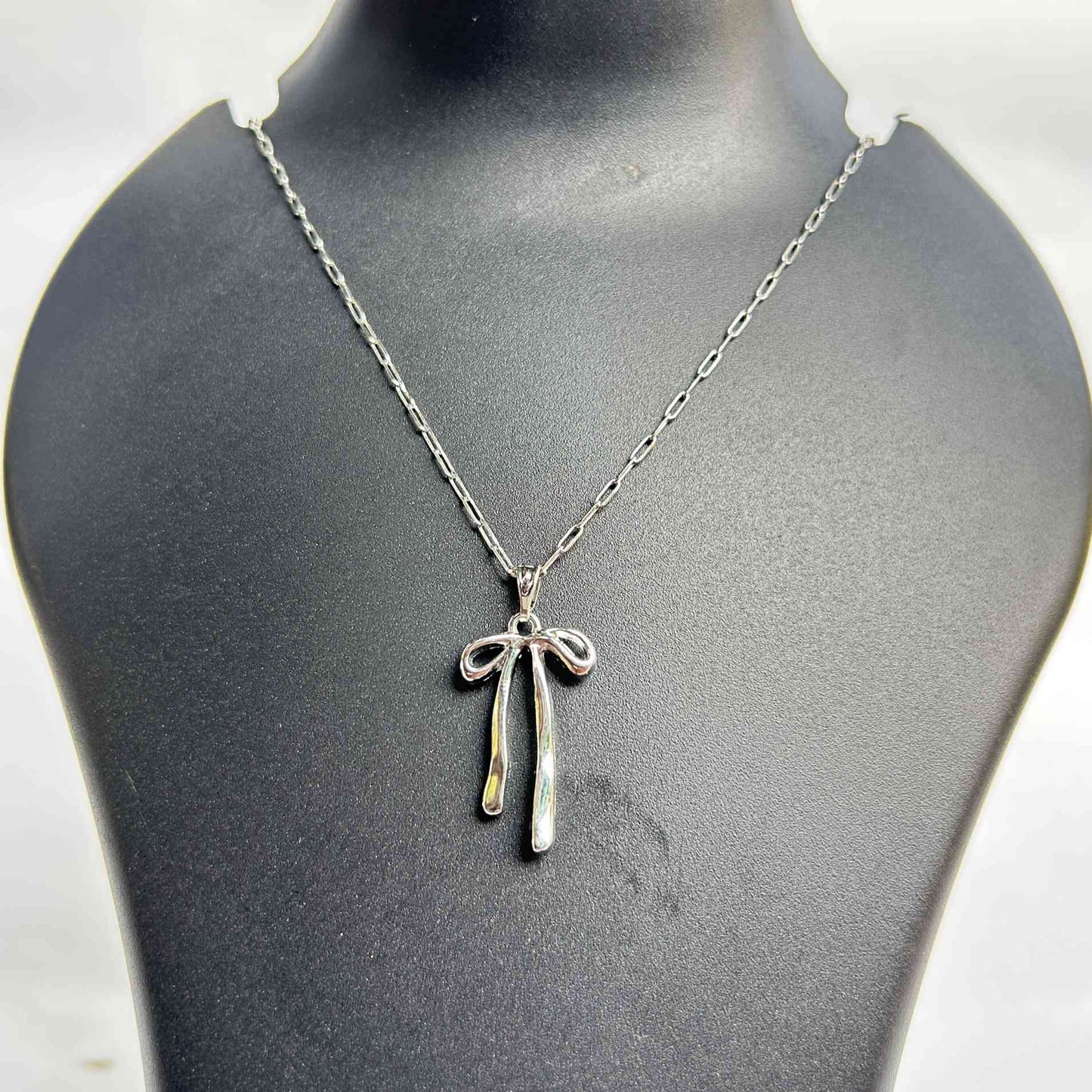 Silver Long Ribbon Bow Pendant Necklace