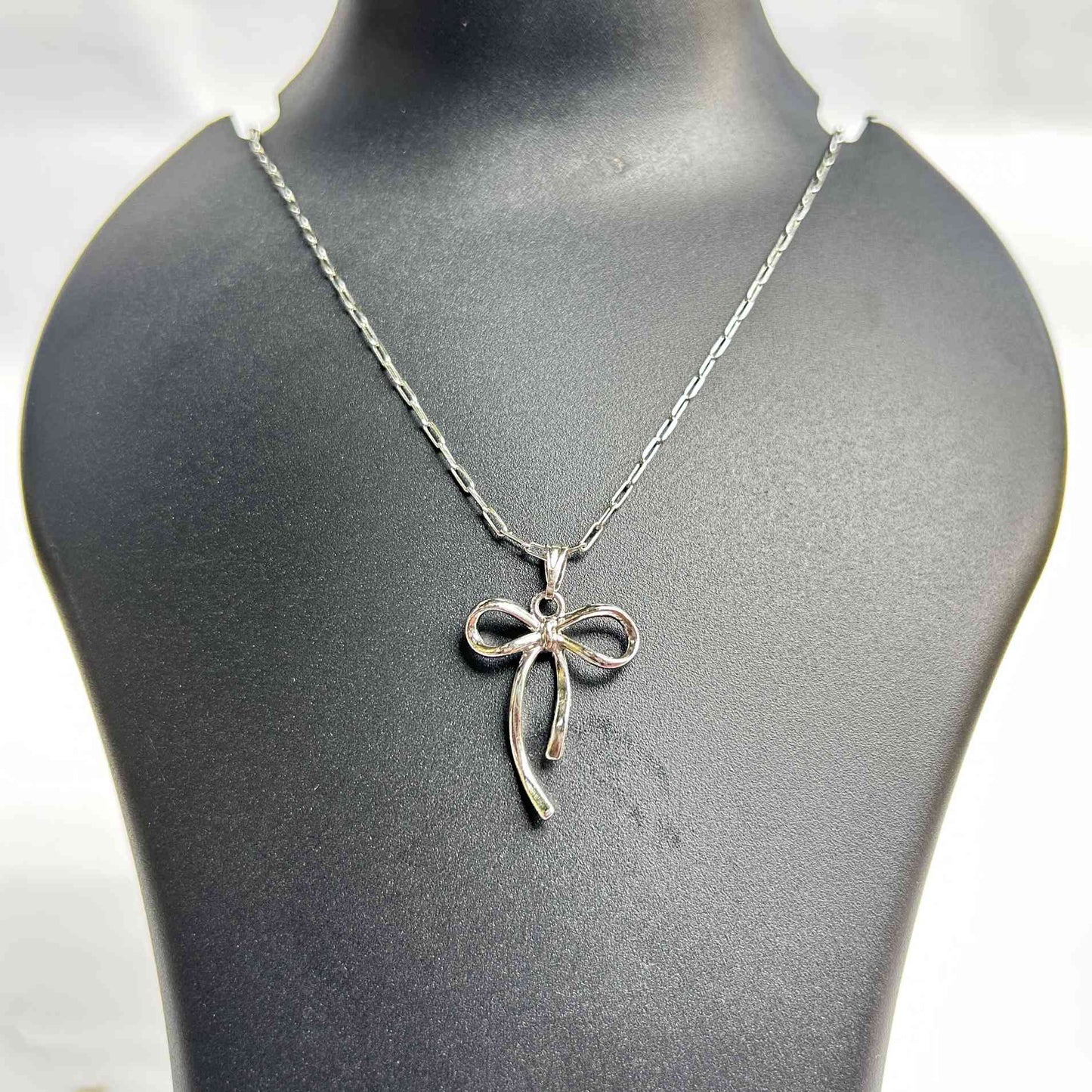 Silver Ribbon Bow Pendant Necklace